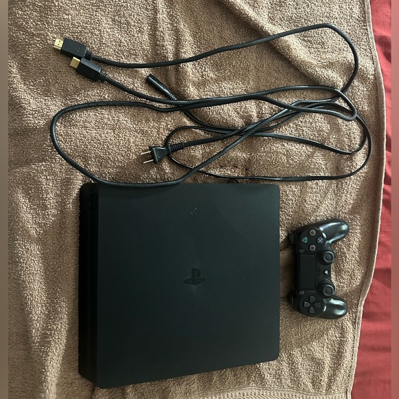 PS4 slim with controller and cables